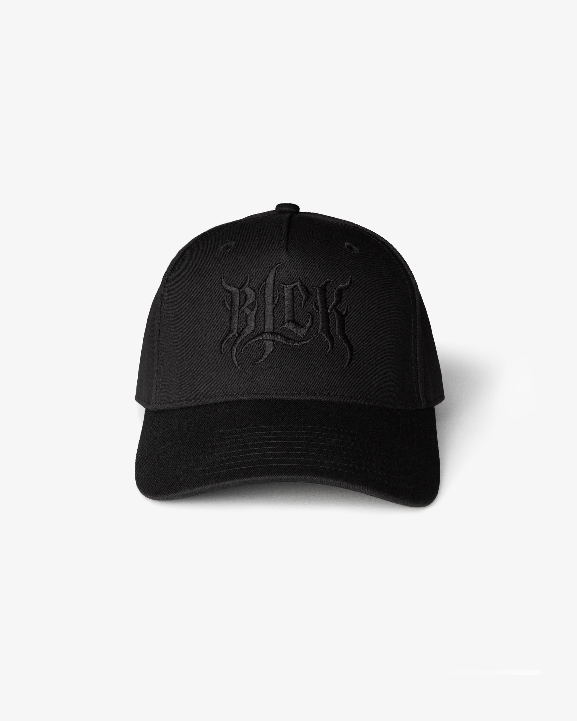 Black cap with embroidered  'BLCK' logo on a white background