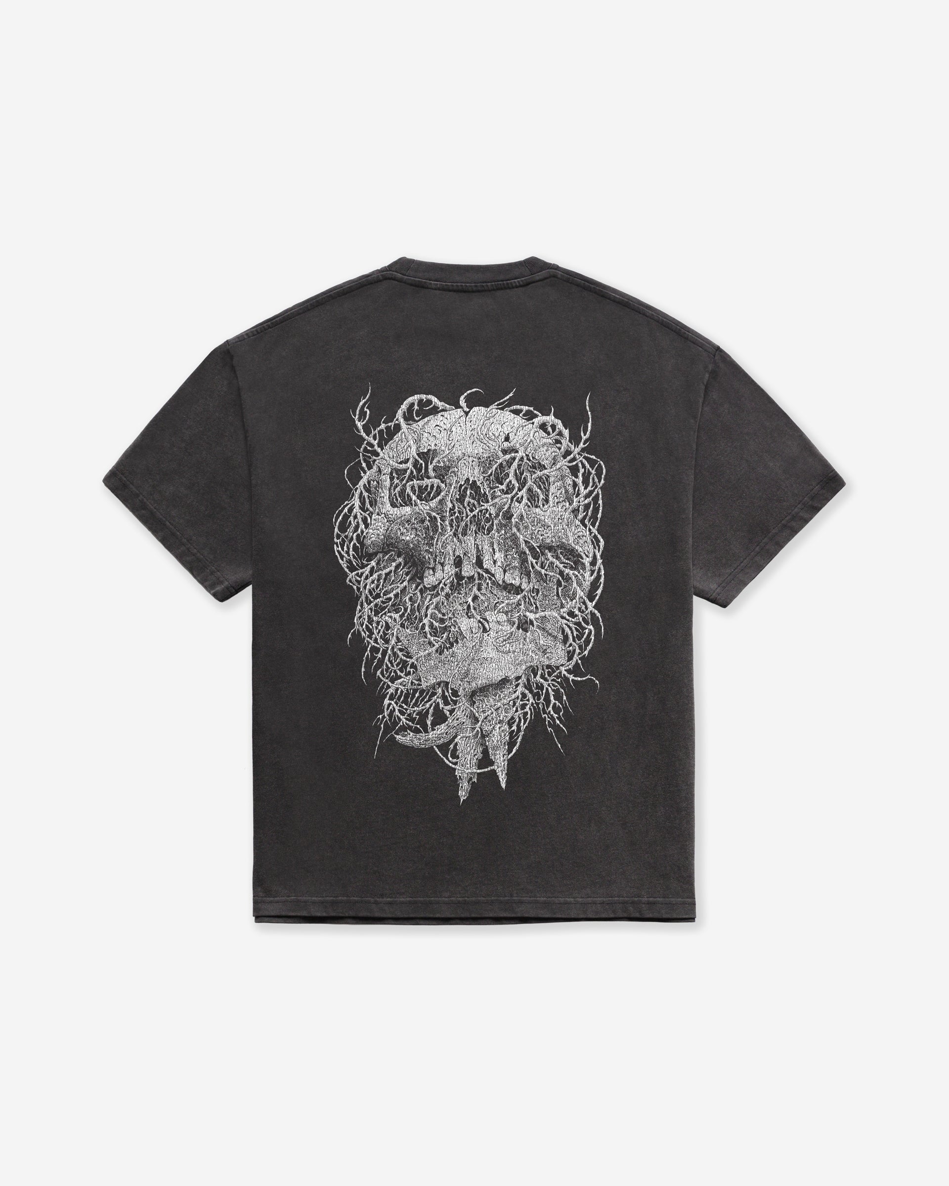 A dark gray acid wash oversized t-shirt with an intricate white skull design, on a white background